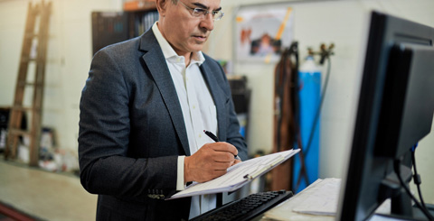 Executive reviewing technology strategy